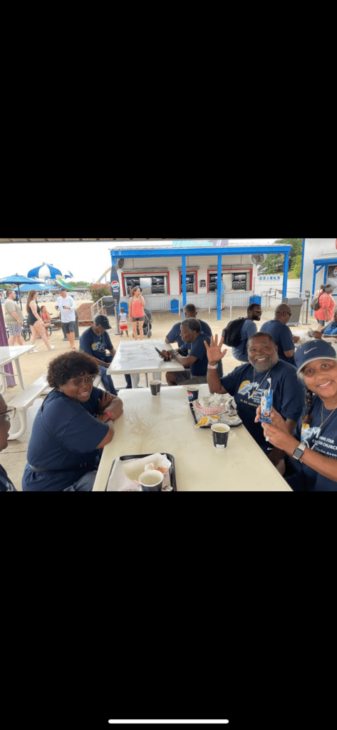A Diverse Group of Individuals Gathered Around a Table